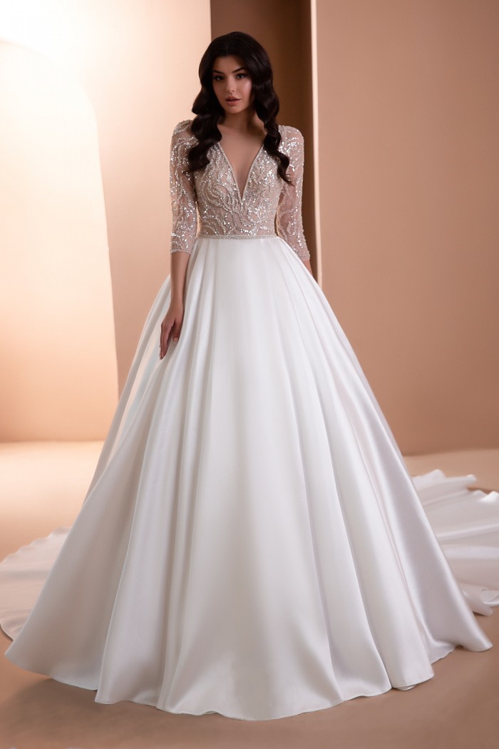 Элегантное свадебное платье с глиттерным лифом, атласной пышной юбкой и с рукавом - РОКСАЛАНА | Paulain