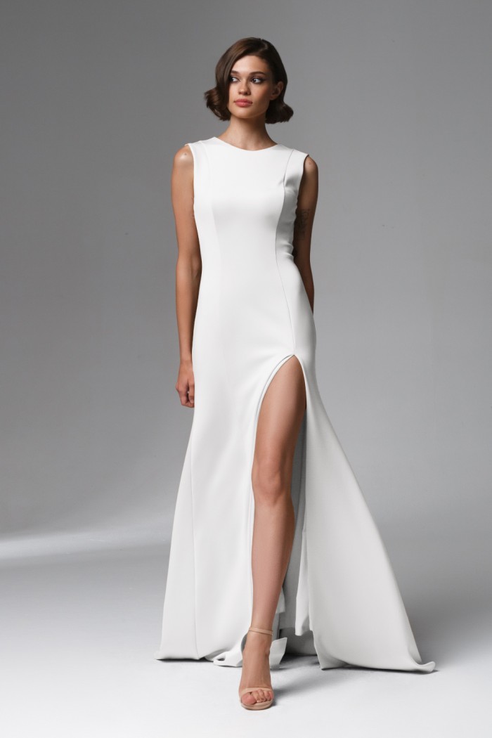 Белое вечернее платье в пол без рукава с V-образным вырезом на спине и разрезом по ноге - ИЛАНА | Paulain