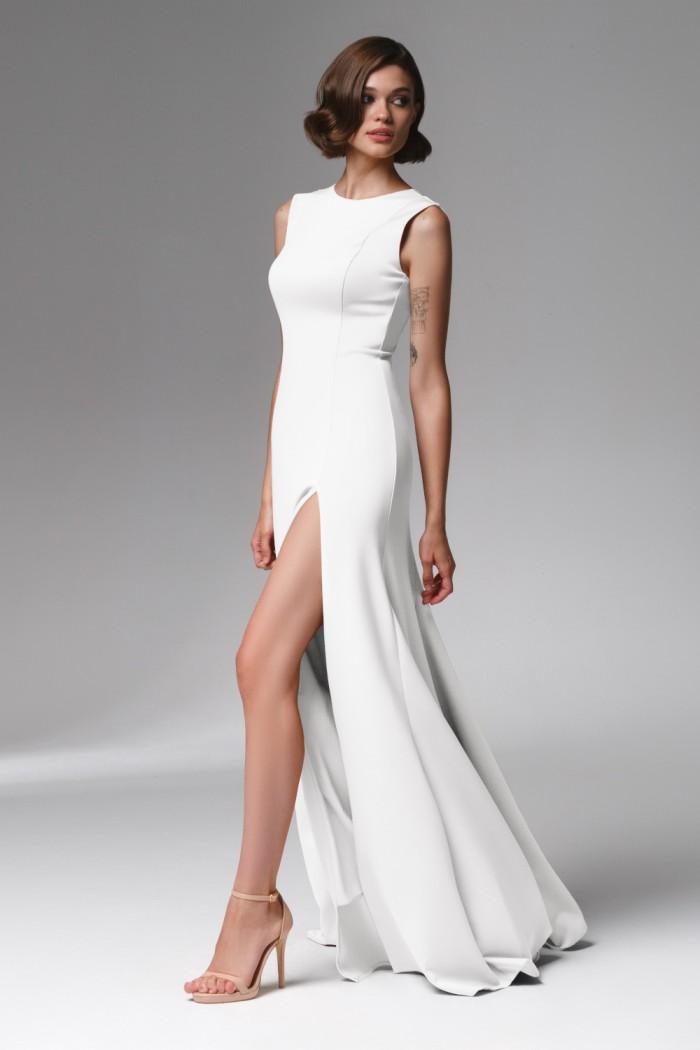 ИЛАНА - Белое вечернее платье в пол без рукава с V-образным вырезом на спине и разрезом по ноге | Paulain