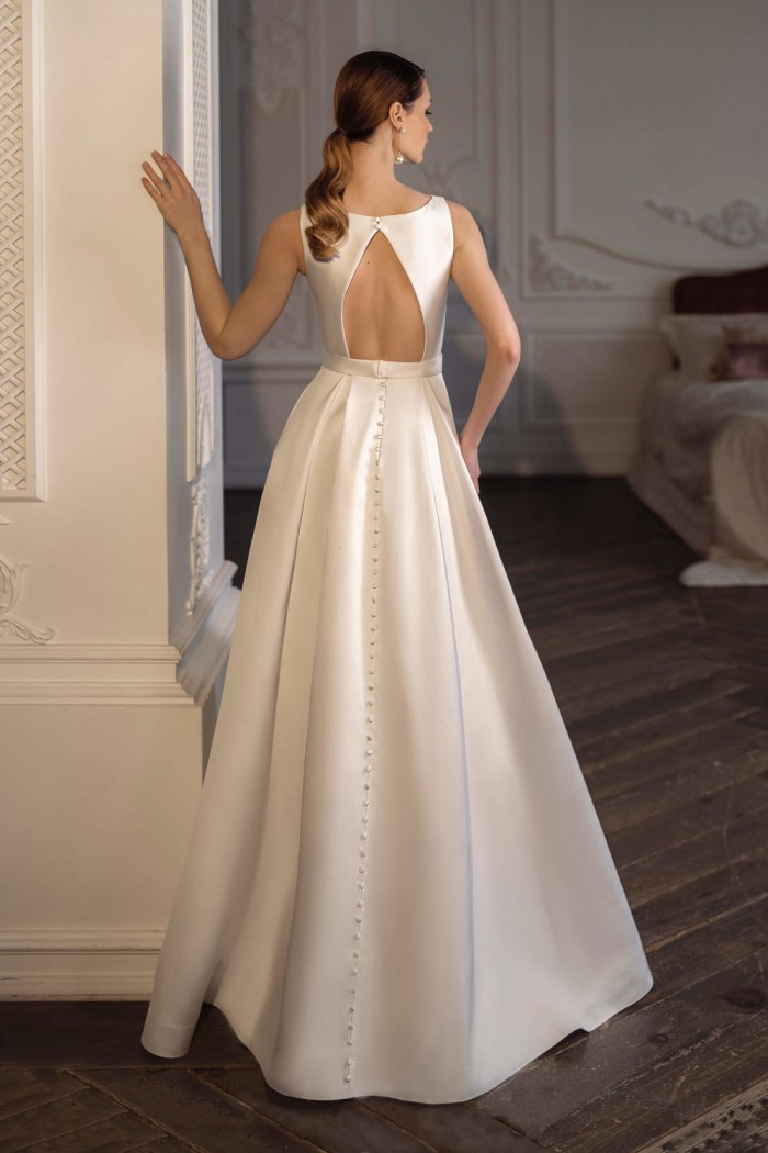 ЭЛЕОНОР - Стильное свадебное платье А-силуэта с юбкой переменной длины, без рукава и открытой спиной | Paulain